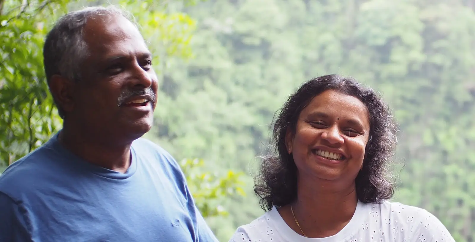 Our parents laughing together outdoors